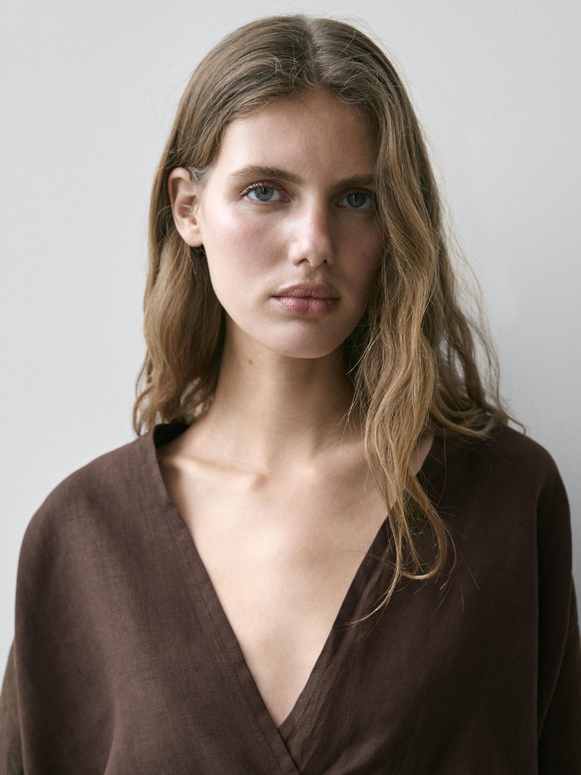 Flowing loose-fitting linen wrap blouse